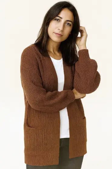 Young mother wearing an oversized cardigann